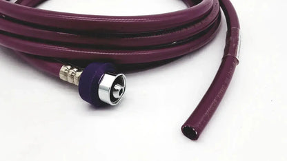 Purple coiled datex ohmeda hose assembly evacuation with metallic connector and purple rubber cap