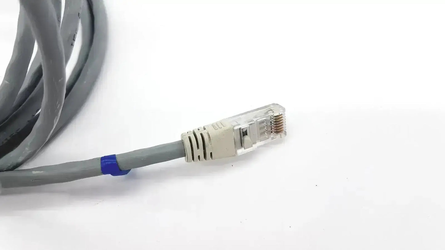 Gray Datex Ohmeda mon ic network cable with beige RJ45 connector and blue tie-wrap 10ft length