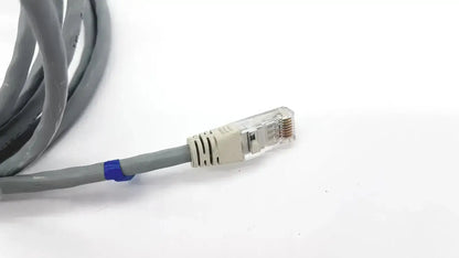Gray Datex Ohmeda mon ic network cable with beige RJ45 connector and blue tie-wrap 10ft length