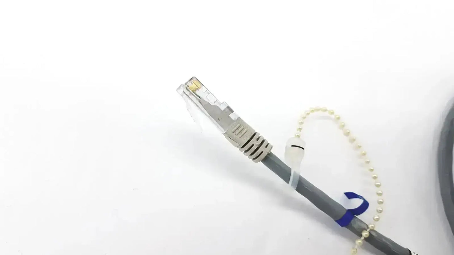 Gray Datex Ohmeda mon ic network cable with silver rj45 connector and pearl chain, 10ft length