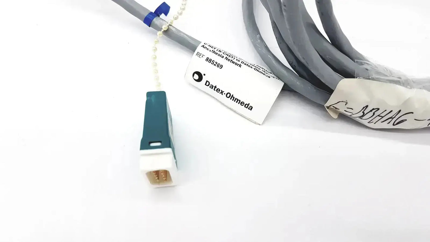 Gray Datex Ohmeda mon ic network cable with teal and white connector labeled datex-ohmeda 10ft length