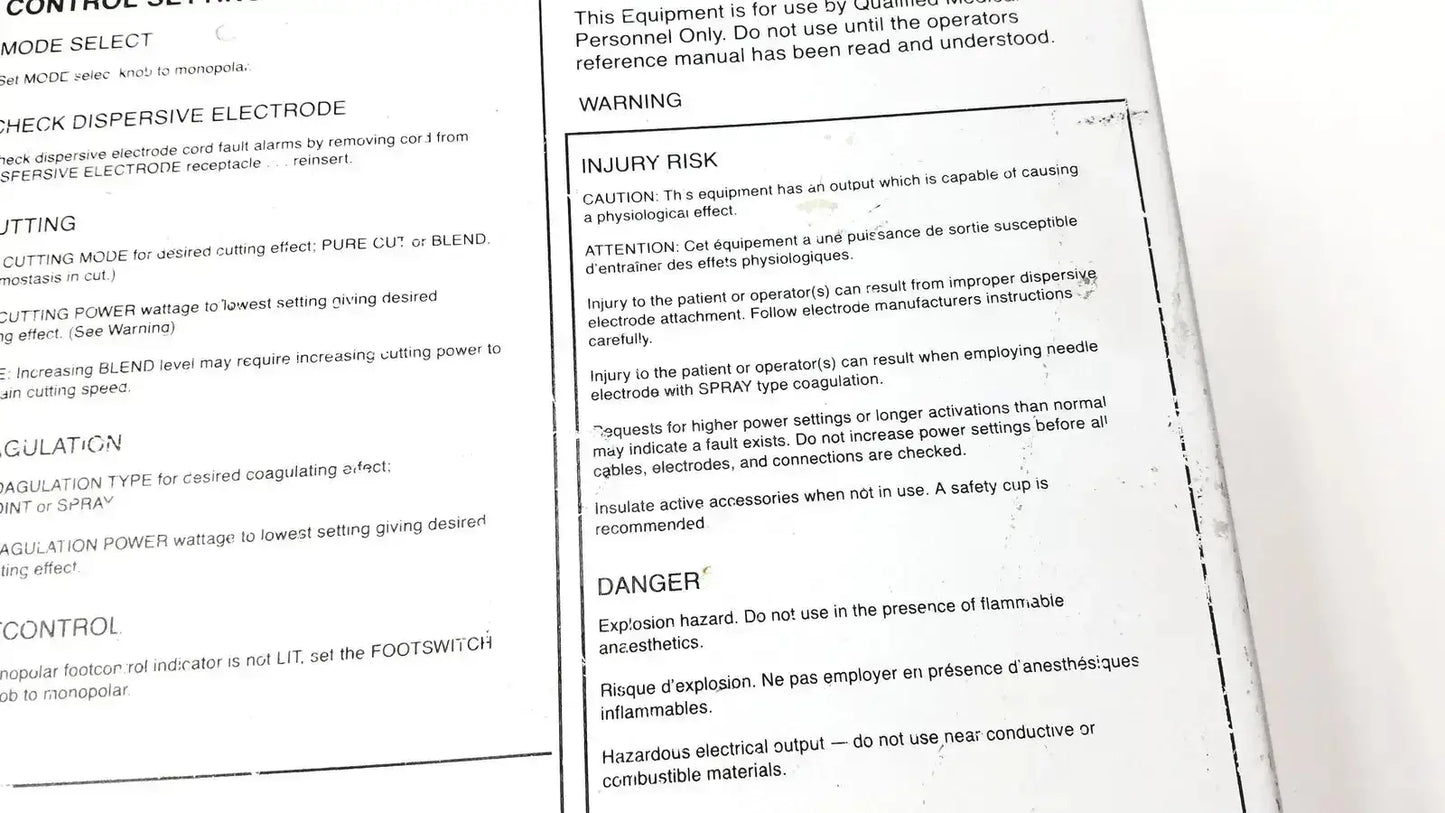 Printed safety warning label in english and french on white paper for davol electro medical system 5000 product