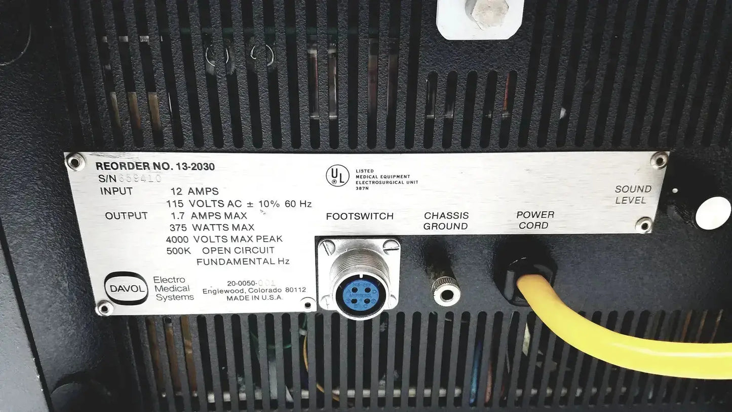 Silver metal label with black text and davol logo showing technical specifications of davol electro medical system 5000