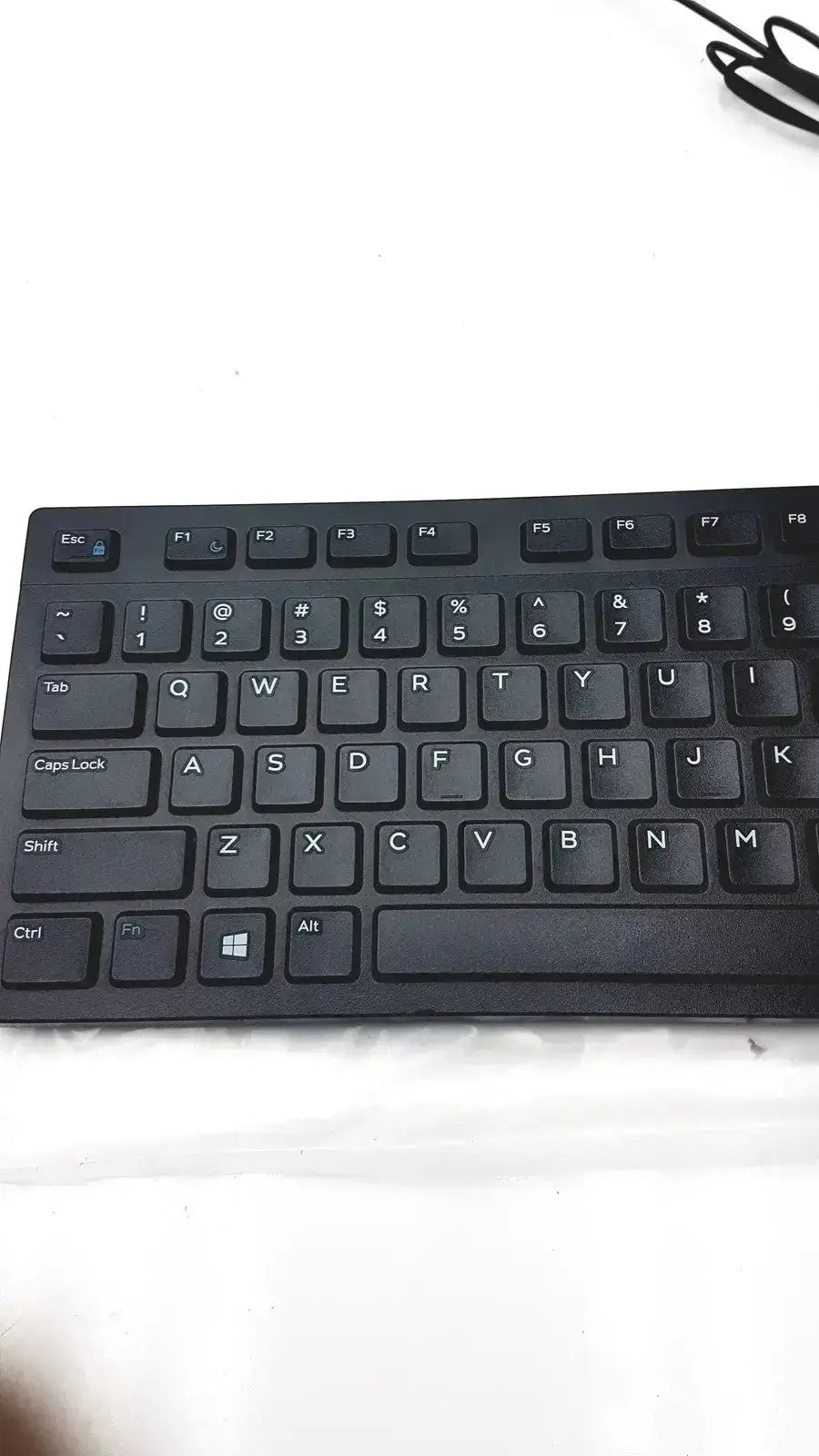 Black plastic wired keyboard with standard qwerty layout and function keys dell kb216-bk-us wired keyboard