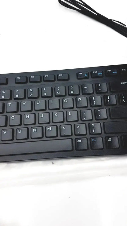 Black plastic dell kb216-bk-us wired keyboard with white lettering and standard qwerty layout for efficient typing