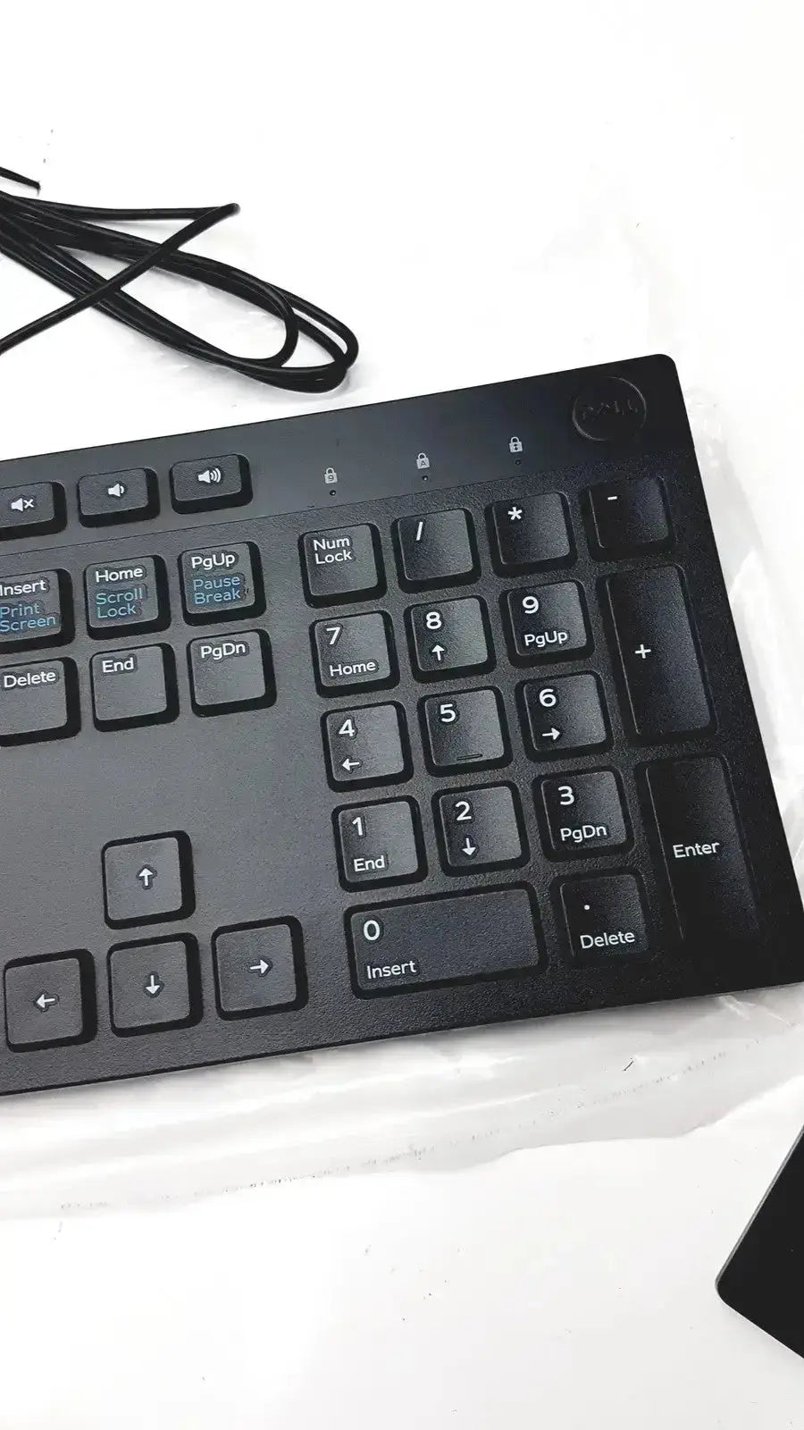 Black dell kb216-bk-us wired keyboard featuring a numeric keypad and function keys for efficient typing