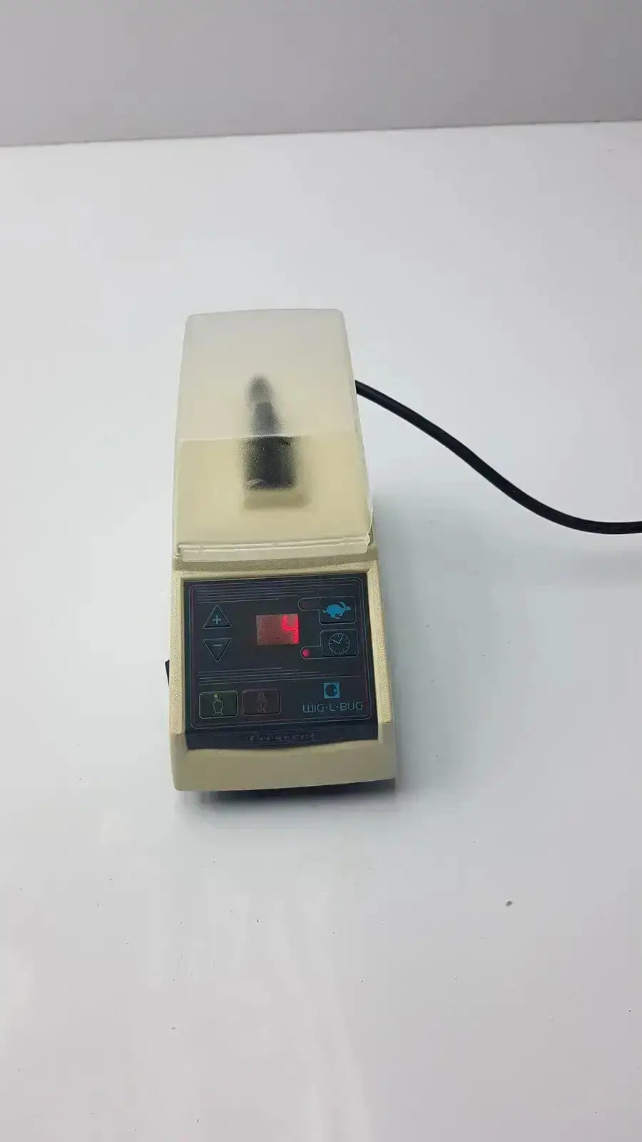 Beige dentsply rinn crescent laboratory-grade vortex mixer with transparent lid and digital control panel