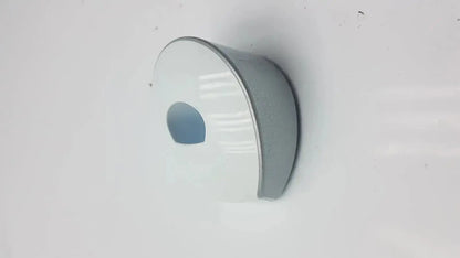 A sleek circular white and gray glossy wall-mounted dentsply sirona smartlite focus curing light charger base only