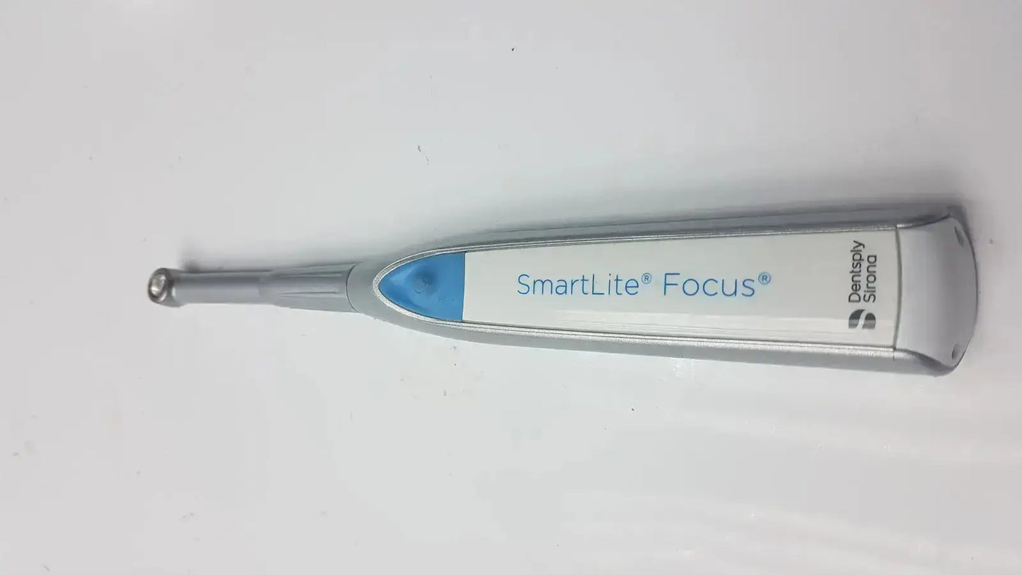 Silver and blue handheld dental curing light with smartlite focus branding for precise dental curing polymerization
