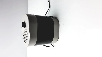 Black and silver cylindrical wall-mounted air purifier with vented front panel for dentsply triad 2000 visible light cure system
