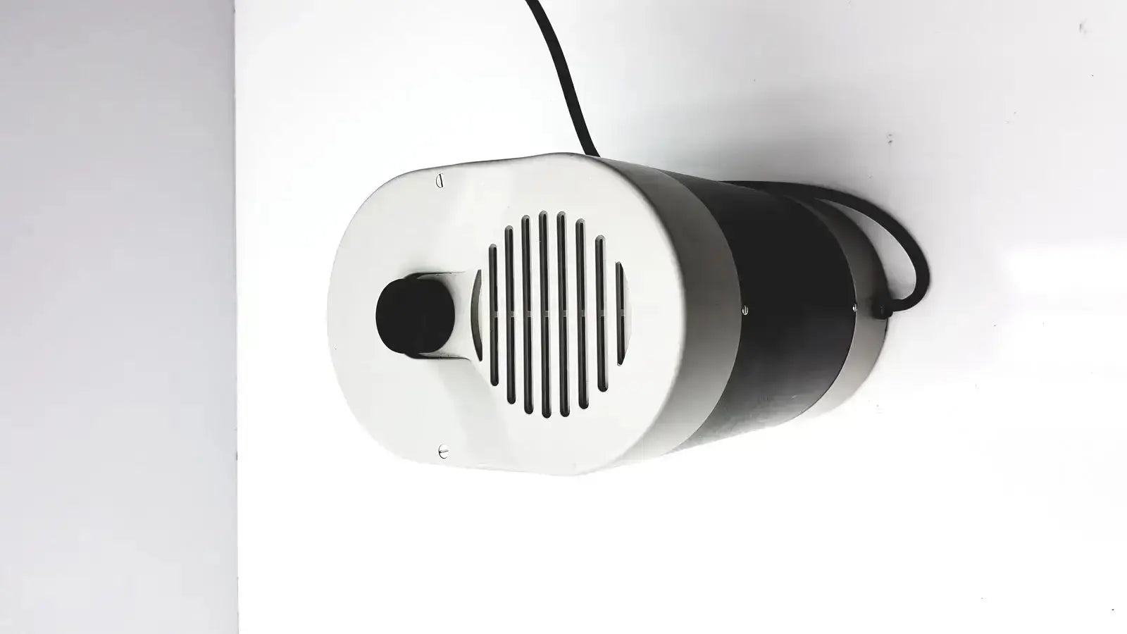 White and black cylindrical speaker with vertical slits for dentsply triad 2000 visible light cure and trubyte curing system