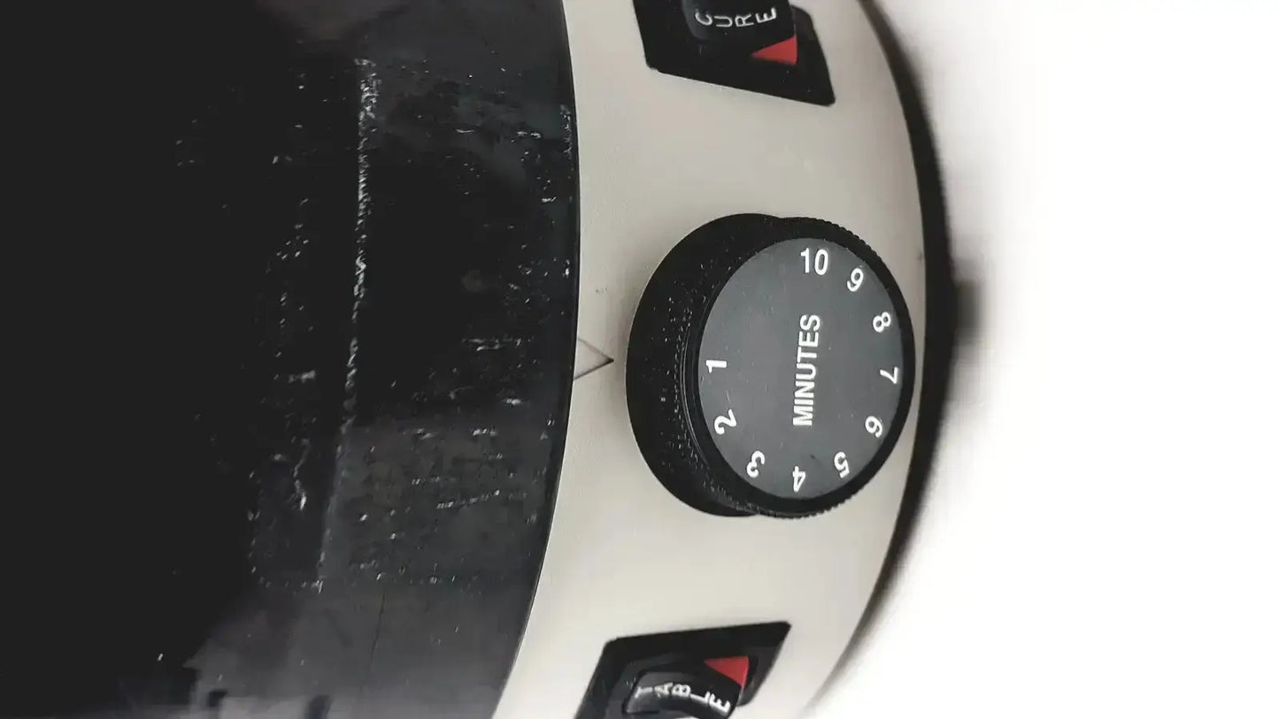 White and black kitchen timer with circular minute dial for dentsply triad 2000 visible light cure trubyte curing system