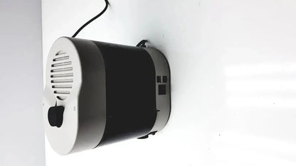 Black and silver wall-mounted air purifier with circular grille used in dentsply triad 2000 visible light cure trubyte curing system