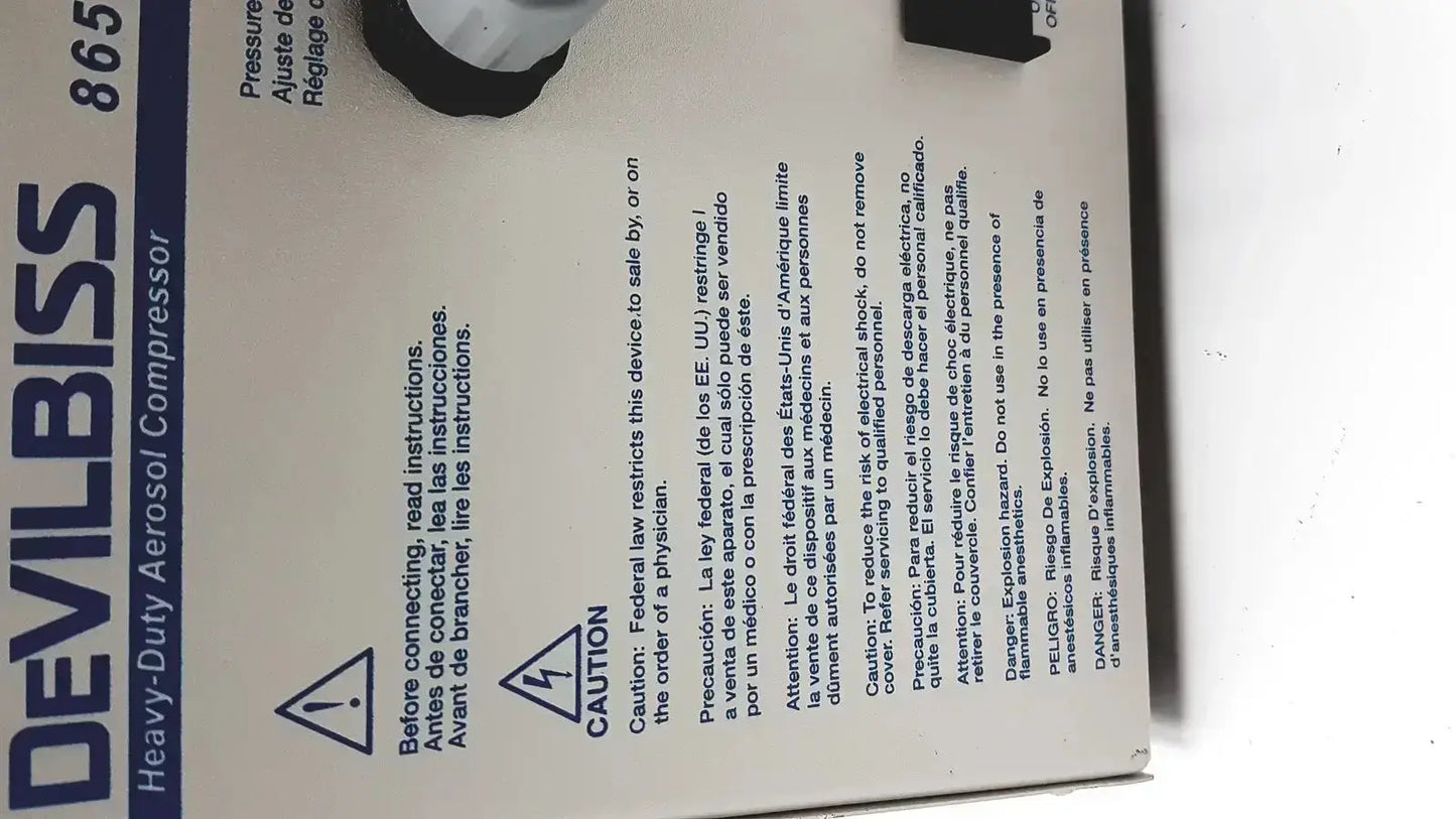 Devilbiss heavy duty aerosol compressor 8650D with black and white plastic housing used medical equipment for sale