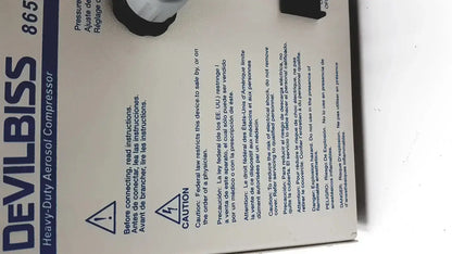 Devilbiss heavy duty aerosol compressor 8650D with black and white plastic housing used medical equipment for sale