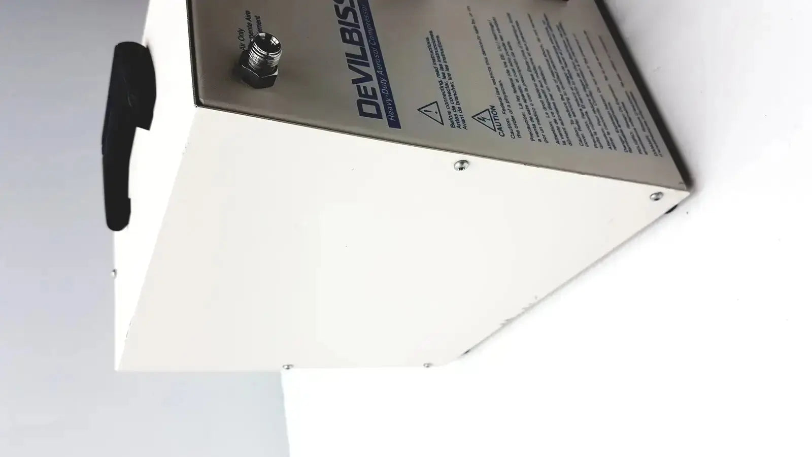 White heavy duty aerosol compressor box with black handle and silver devilbis label used medical equipment for sale