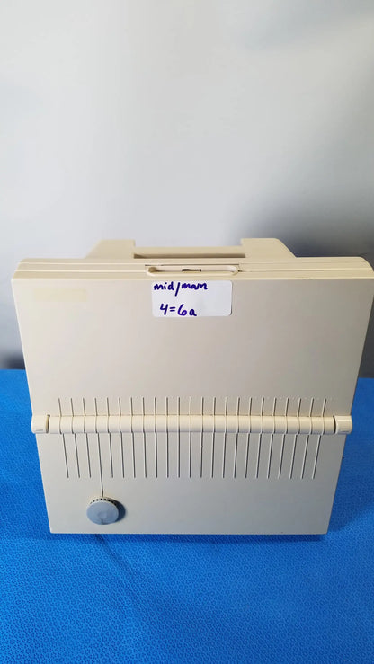 Beige plastic mid-fountain de vilbiss 5650d pulmo-aide compressor nebulizer system with handle and vertical slits for medical equipment reuse