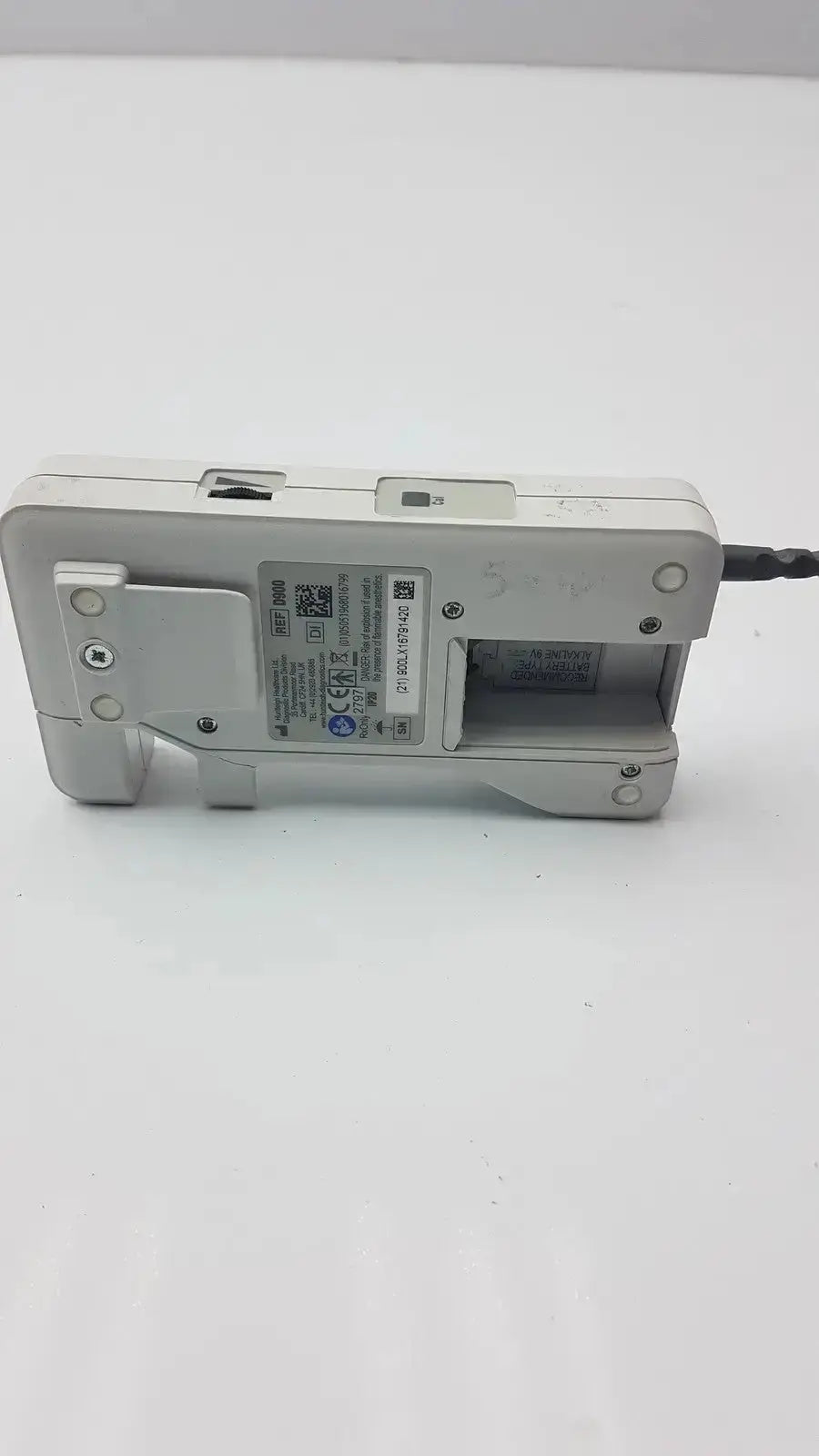 White plastic doppllex d900 handheld portable doppler with black cable extending from its side for medical use