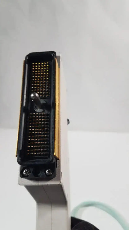 Black and gold electronic connector with metallic pins on the back of dornier acoustic imaging curved array ultrasound transducer