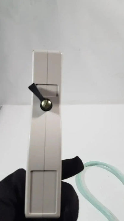 Beige plastic hand-held dornier acoustic imaging curved array ultrasound transducer with black toggle and green tube