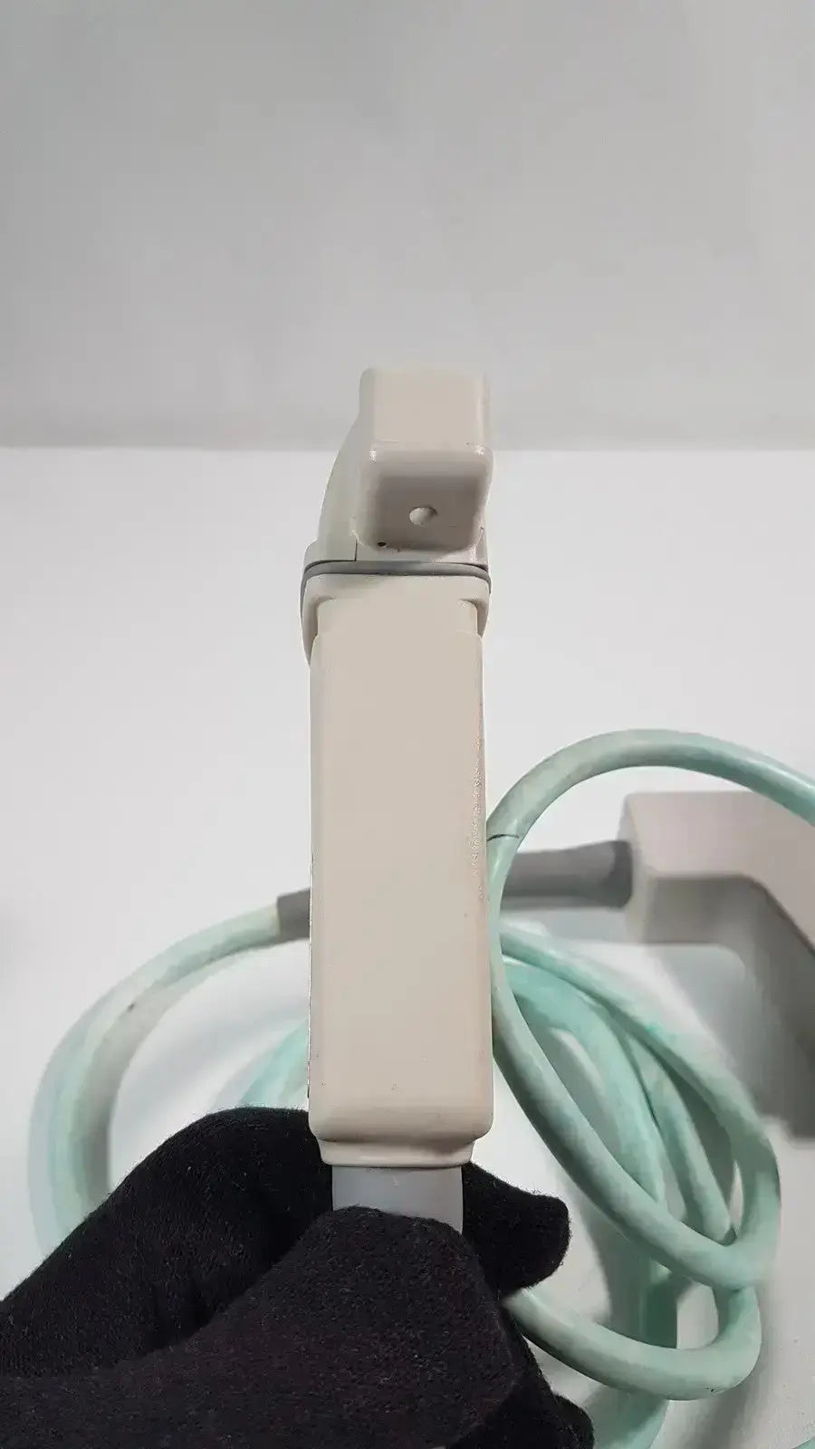 Beige plastic handle with coiled light green cable for dornier acoustic imaging curved array ultrasound transducer