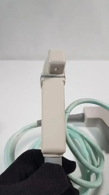 Beige plastic handle with coiled light green cable for dornier acoustic imaging curved array ultrasound transducer