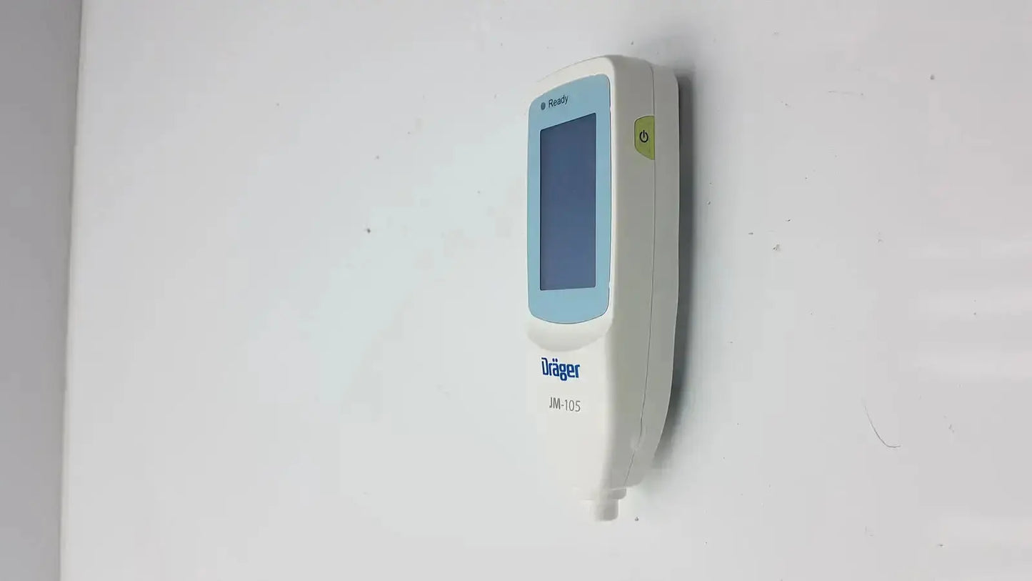 White dräger jm-105 jaundice meter with light blue display screen and green power button for drager jaundice measurement