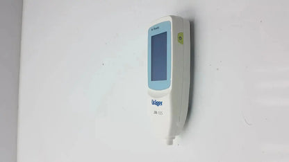 White dräger jm-105 jaundice meter with light blue display screen and green power button for drager jaundice measurement