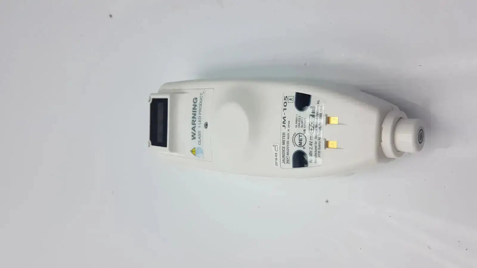 White plastic digital drager jaundice meter jm-105 with black display and yellow test probes for accurate jaundice measurement