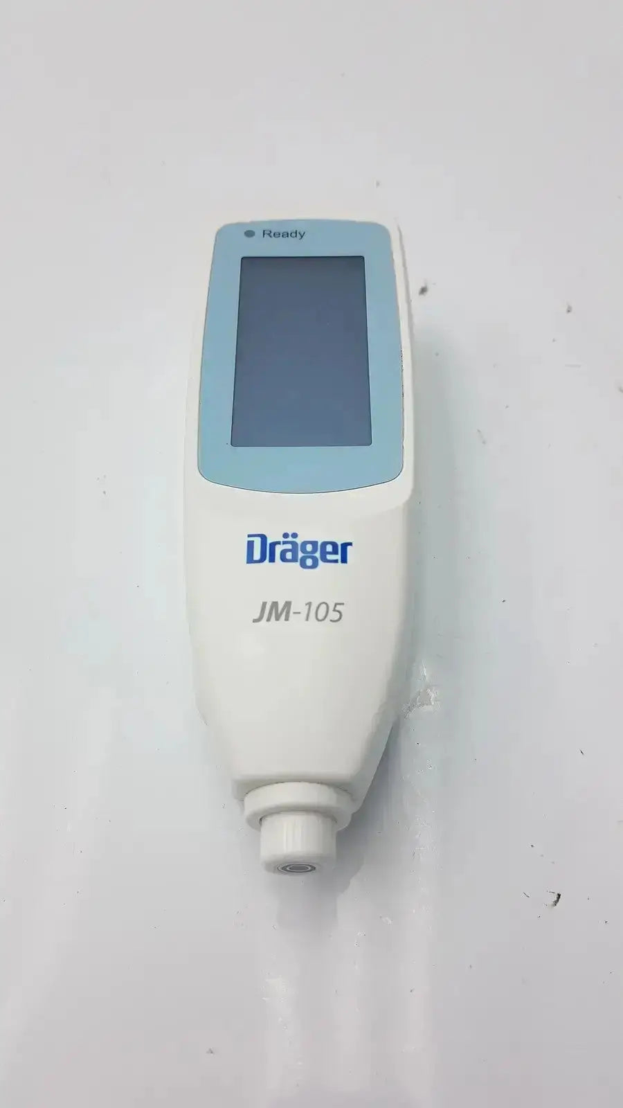 White and light blue drager jaundice meter jm-105 handheld device with digital screen for noninvasive bilirubin measurement