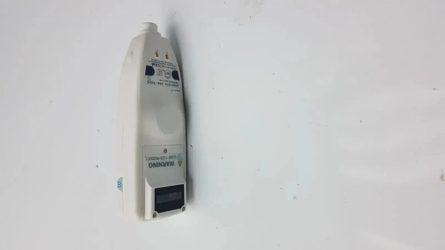 White plastic wall-mounted electrical outlet cover with black labeling and display window for drager jaundice meter jm-105