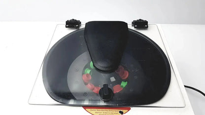 Black plastic rotary caster with red and green components on transparent base for drucker horizon laboratory centrifuge 755v