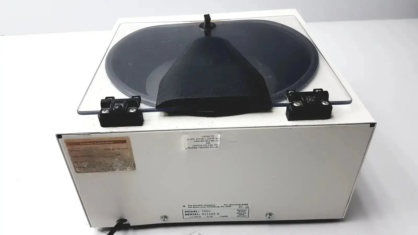 Drucker Horizon laboratory centrifuge 755v with white rectangular body and black conical rotor cover in pre owned medical equipment sale