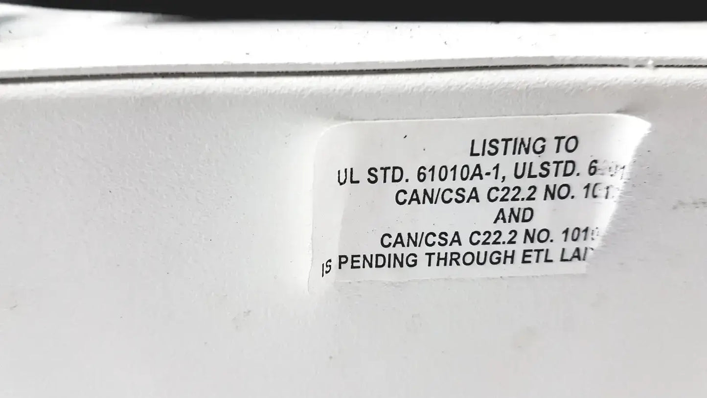 White rectangular label with black text showing safety certifications on the back of drucker horizon laboratory centrifuge 755v for pre owned medical equipment