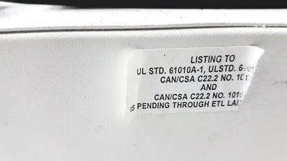 White rectangular label with black text showing safety certifications on the back of drucker horizon laboratory centrifuge 755v for pre owned medical equipment