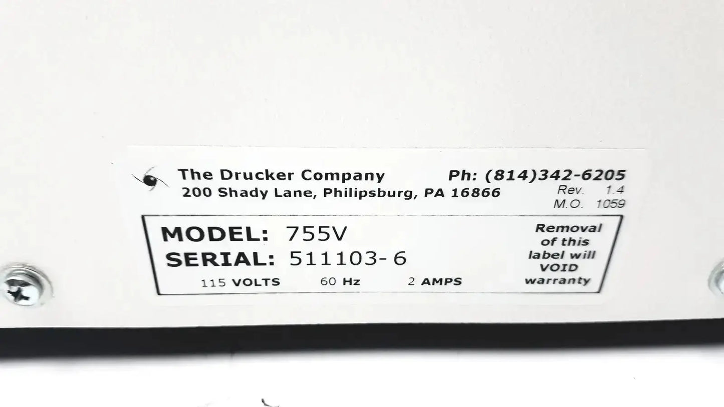 White rectangular label with manufacturer details and specs on the back of a drucker horizon laboratory centrifuge 755v for pre owned medical equipment sale