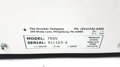 White rectangular label with manufacturer details and specs on the back of a drucker horizon laboratory centrifuge 755v for pre owned medical equipment sale