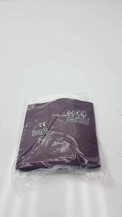 Dark purple latex-free duracuff critikon blood pressure cuff model 2204 for large adults packaged in clear plastic