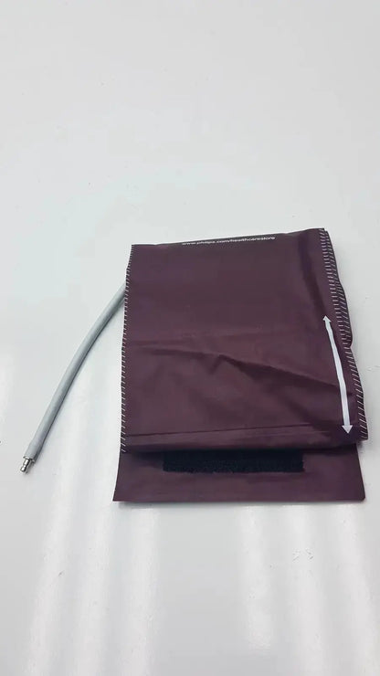Maroon Dura Cuff Critikon blood pressure cuff model 2204 with gray tube for accurate blood pressure measurement
