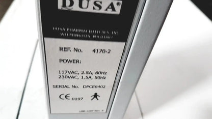 Dusa blu blue light photodynamic therapy system 4170-2 with black and white air compressor label showing power specs