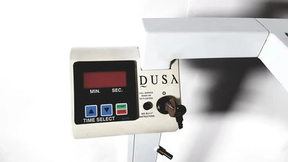 White dusa brand industrial timer with digital display and control buttons for dusa blu blue light photodynamic therapy system