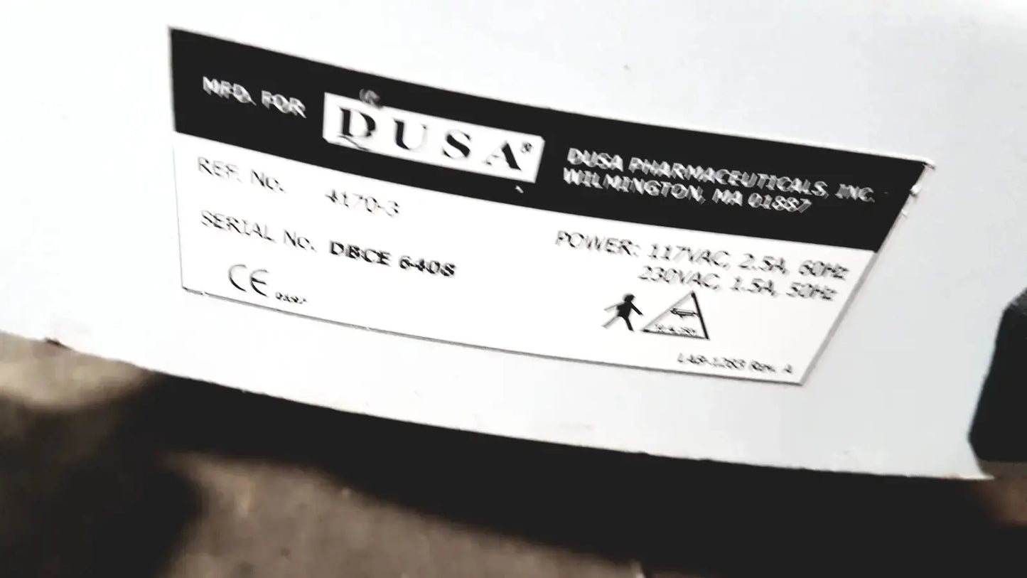 Black and white label for dusa pharmaceuticals inc on dusa blu blue light photodynamic therapy system 4170-2 product