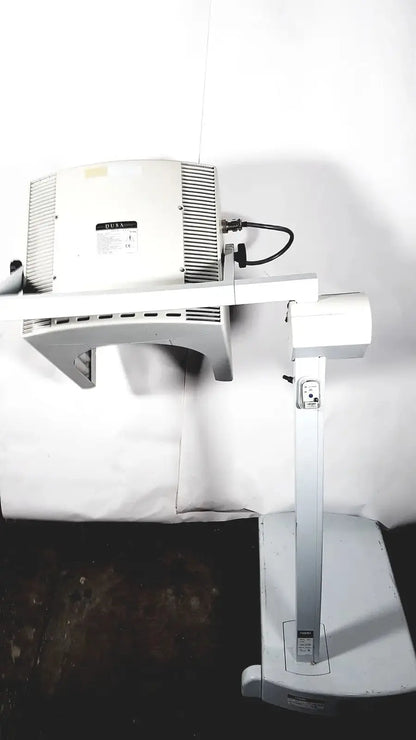 White overhead document scanner with vertical arm in dusa blu blue light photodynamic therapy system 4170-2
