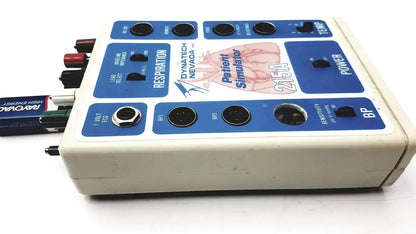 Beige plastic dynatech nevada 215a portable lightweight respiratory patient simulator with blue panels and black knobs