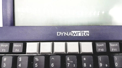 Dark blue dynawrite speech processor laptop keyboard with black and gray keys featuring white lettering by dynavox dynawrite speech