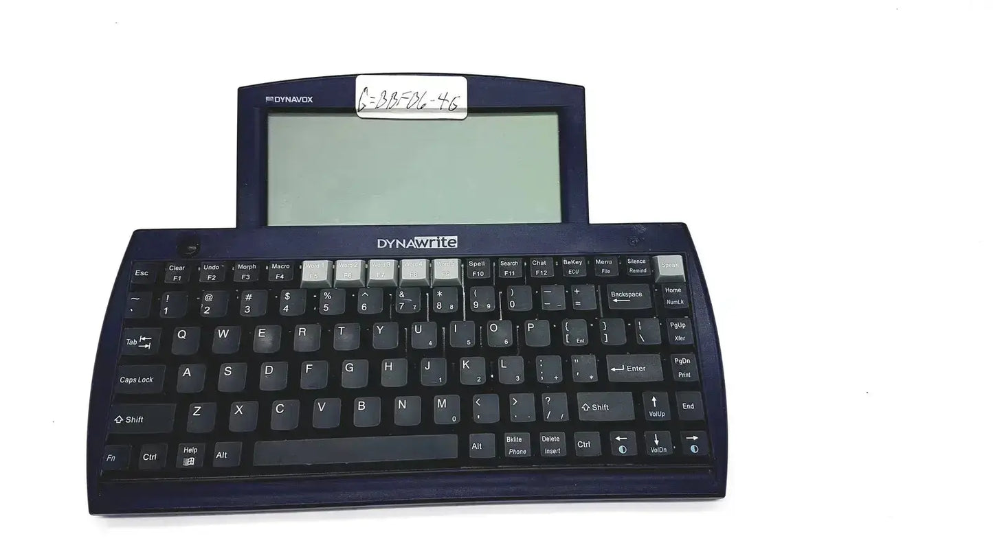 Dark blue dynavox dynawrite speech processor handheld computer with integrated keyboard and screen for speech processing