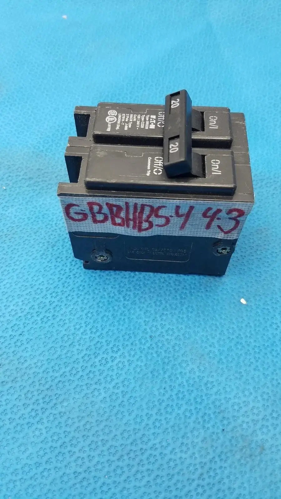 Black dual-pole 20 amp eaton br220 circuit breaker with handwritten code suitable for reuse medical equipment safety systems