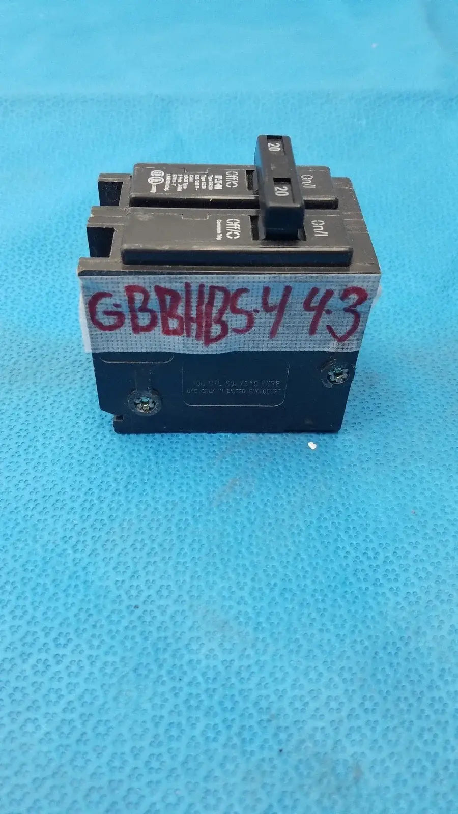 Black Eaton BR220 2-pole 20 amp circuit breaker with red handwritten label suitable for reuse medical equipment applications