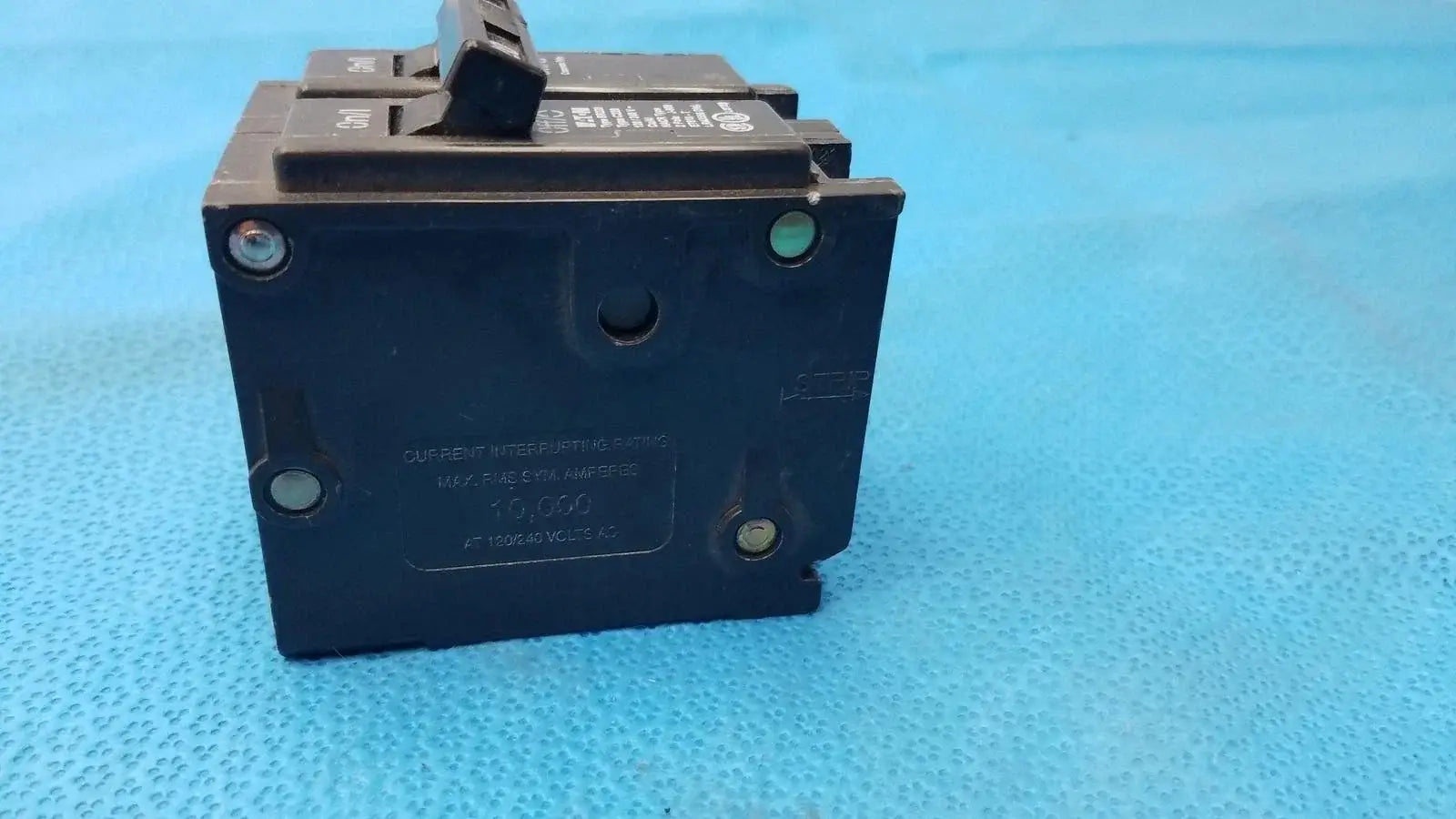 Black plastic eaton br220 2-pole 20 amp circuit breaker with toggle switch for reuse medical equipment safety