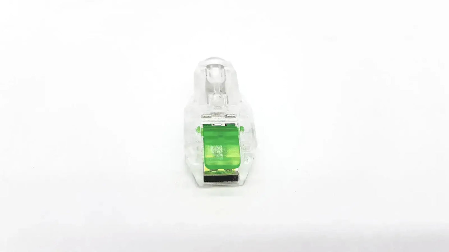 Clear plastic ecg adapter clip with bright green internal component and black terminal ends for secure electrical connection